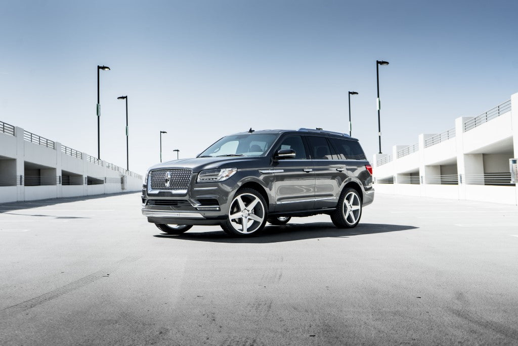 2015 Lincoln Navigator fitted with 24″ Blaque Diamond BD-15s in Silver with Machined Face