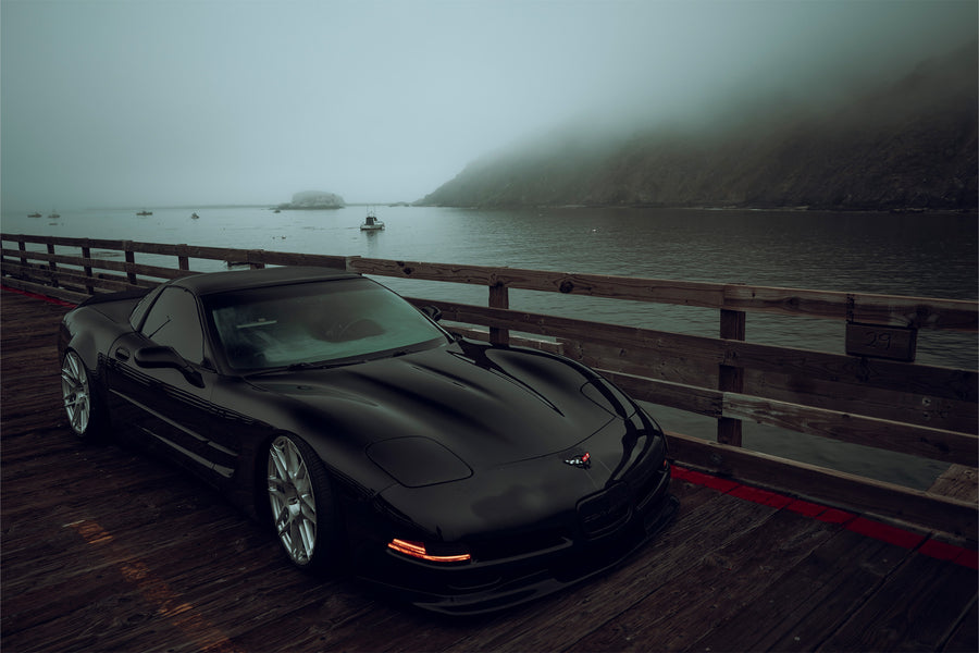 The Chevrolet Corvette stands tall as one of America's most iconic performance vehicles, a quintessential muscle car that has captivated generations of automotive enthusiasts. The C5 Corvette made its debut in 1996, eventually succeeded by the C6 Corvette in 2005. Renowned for its robust 5.7L LS1 engine, delivering 345 horsepower and 350 lb-ft of torque, the C5 was also notable for being the final model to feature the iconic popup headlights. This 2001 Chevrolet Corvette has undergone significan