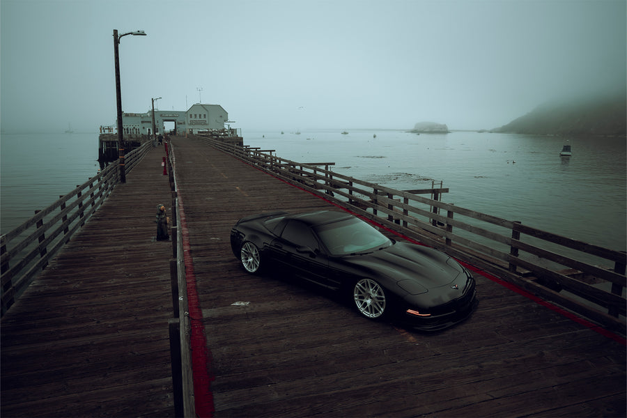 The Chevrolet Corvette stands tall as one of America's most iconic performance vehicles, a quintessential muscle car that has captivated generations of automotive enthusiasts. The C5 Corvette made its debut in 1996, eventually succeeded by the C6 Corvette in 2005. Renowned for its robust 5.7L LS1 engine, delivering 345 horsepower and 350 lb-ft of torque, the C5 was also notable for being the final model to feature the iconic popup headlights. This 2001 Chevrolet Corvette has undergone significan