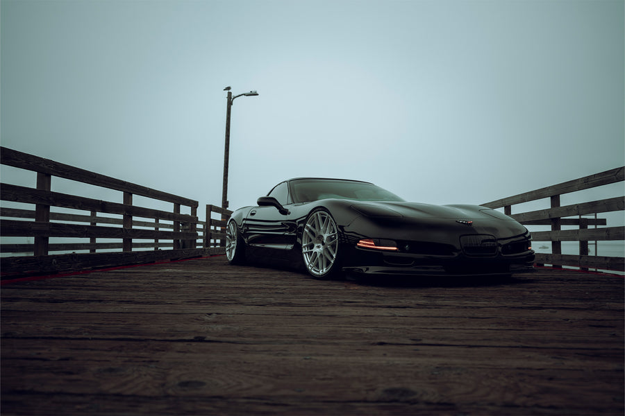 The Chevrolet Corvette stands tall as one of America's most iconic performance vehicles, a quintessential muscle car that has captivated generations of automotive enthusiasts. The C5 Corvette made its debut in 1996, eventually succeeded by the C6 Corvette in 2005. Renowned for its robust 5.7L LS1 engine, delivering 345 horsepower and 350 lb-ft of torque, the C5 was also notable for being the final model to feature the iconic popup headlights. This 2001 Chevrolet Corvette has undergone significan