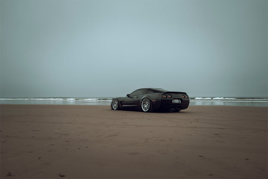 The Chevrolet Corvette stands tall as one of America's most iconic performance vehicles, a quintessential muscle car that has captivated generations of automotive enthusiasts. The C5 Corvette made its debut in 1996, eventually succeeded by the C6 Corvette in 2005. Renowned for its robust 5.7L LS1 engine, delivering 345 horsepower and 350 lb-ft of torque, the C5 was also notable for being the final model to feature the iconic popup headlights. This 2001 Chevrolet Corvette has undergone significan