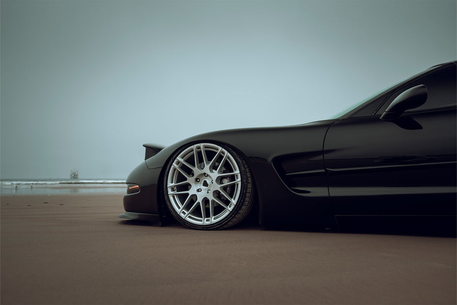 The Chevrolet Corvette stands tall as one of America's most iconic performance vehicles, a quintessential muscle car that has captivated generations of automotive enthusiasts. The C5 Corvette made its debut in 1996, eventually succeeded by the C6 Corvette in 2005. Renowned for its robust 5.7L LS1 engine, delivering 345 horsepower and 350 lb-ft of torque, the C5 was also notable for being the final model to feature the iconic popup headlights. This 2001 Chevrolet Corvette has undergone significan