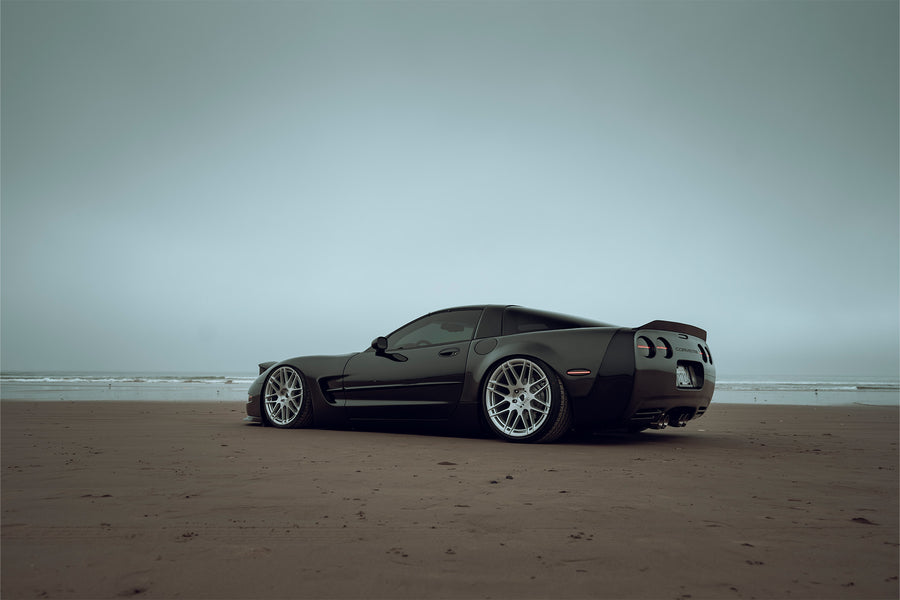 The Chevrolet Corvette stands tall as one of America's most iconic performance vehicles, a quintessential muscle car that has captivated generations of automotive enthusiasts. The C5 Corvette made its debut in 1996, eventually succeeded by the C6 Corvette in 2005. Renowned for its robust 5.7L LS1 engine, delivering 345 horsepower and 350 lb-ft of torque, the C5 was also notable for being the final model to feature the iconic popup headlights. This 2001 Chevrolet Corvette has undergone significan