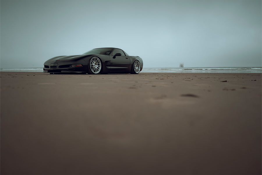 The Chevrolet Corvette stands tall as one of America's most iconic performance vehicles, a quintessential muscle car that has captivated generations of automotive enthusiasts. The C5 Corvette made its debut in 1996, eventually succeeded by the C6 Corvette in 2005. Renowned for its robust 5.7L LS1 engine, delivering 345 horsepower and 350 lb-ft of torque, the C5 was also notable for being the final model to feature the iconic popup headlights. This 2001 Chevrolet Corvette has undergone significan