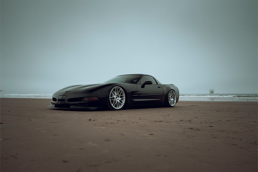 The Chevrolet Corvette stands tall as one of America's most iconic performance vehicles, a quintessential muscle car that has captivated generations of automotive enthusiasts. The C5 Corvette made its debut in 1996, eventually succeeded by the C6 Corvette in 2005. Renowned for its robust 5.7L LS1 engine, delivering 345 horsepower and 350 lb-ft of torque, the C5 was also notable for being the final model to feature the iconic popup headlights. This 2001 Chevrolet Corvette has undergone significan