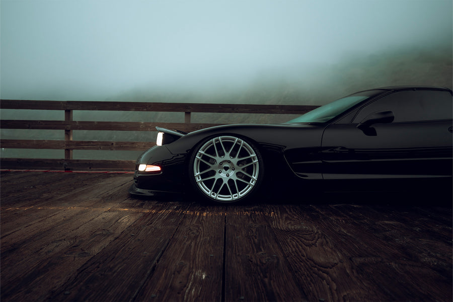 The Chevrolet Corvette stands tall as one of America's most iconic performance vehicles, a quintessential muscle car that has captivated generations of automotive enthusiasts. The C5 Corvette made its debut in 1996, eventually succeeded by the C6 Corvette in 2005. Renowned for its robust 5.7L LS1 engine, delivering 345 horsepower and 350 lb-ft of torque, the C5 was also notable for being the final model to feature the iconic popup headlights. This 2001 Chevrolet Corvette has undergone significan