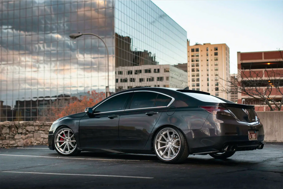 A 2012 Acura TL on Blaque Diamond BD-23 Silver Machined with Chrome Lip Wheels