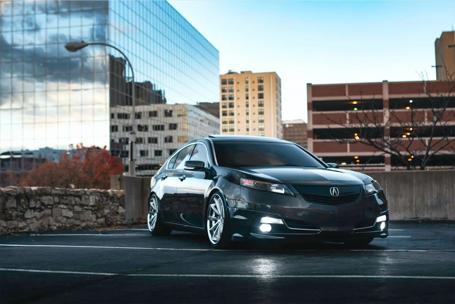 A 2012 Acura TL on Blaque Diamond BD-23 Silver Machined with Chrome Lip Wheels