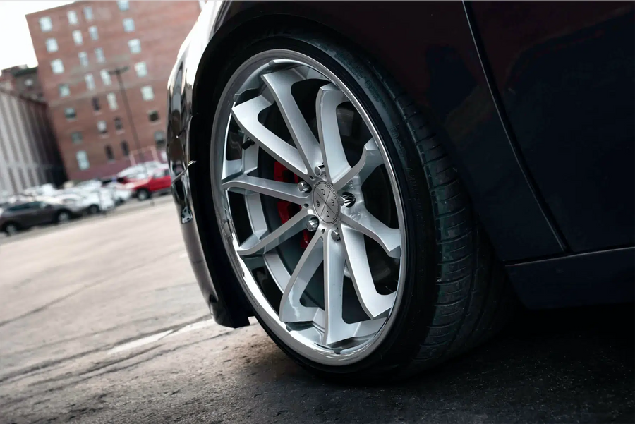 A 2012 Acura TL on Blaque Diamond BD-23 Silver Machined with Chrome Lip Wheels