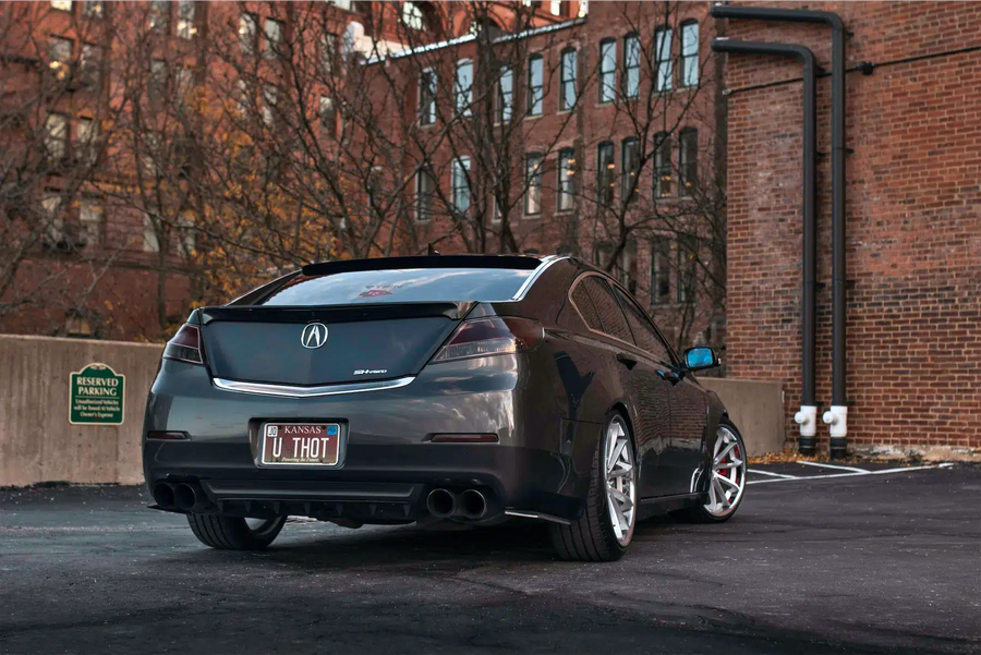 A 2012 Acura TL on Blaque Diamond BD-23 Silver Machined with Chrome Lip Wheels