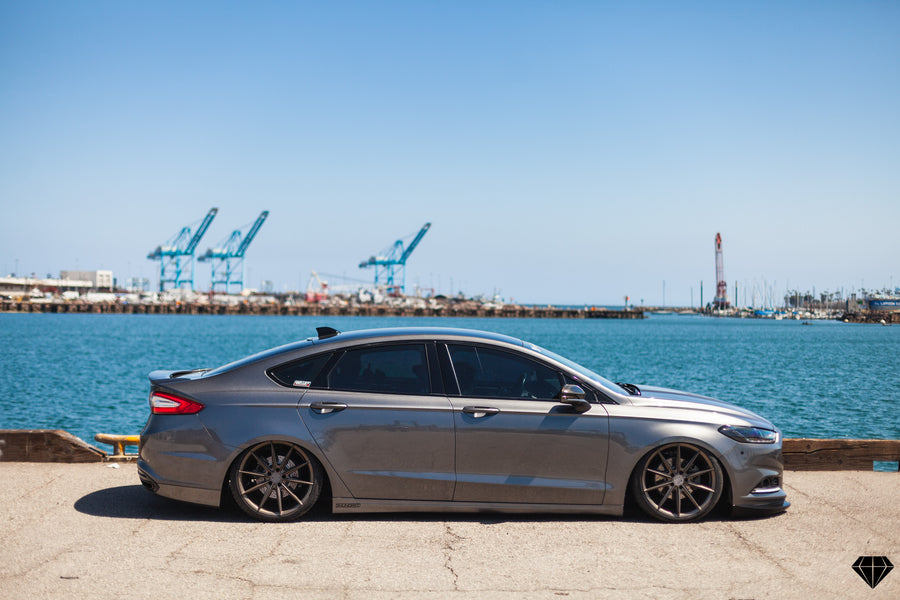 A 2013 Ford Fusion on Blaque Diamond BD-11 Gloss Black Wheels