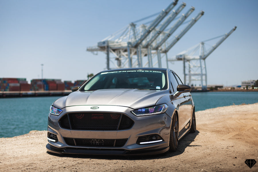 A 2013 Ford Fusion on Blaque Diamond BD-11 Gloss Black Wheels