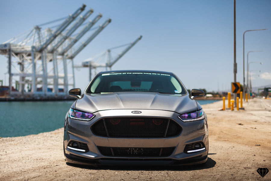 A 2013 Ford Fusion on Blaque Diamond BD-11 Gloss Black Wheels