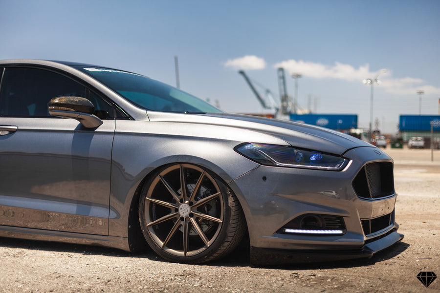 A 2013 Ford Fusion on Blaque Diamond BD-11 Gloss Black Wheels