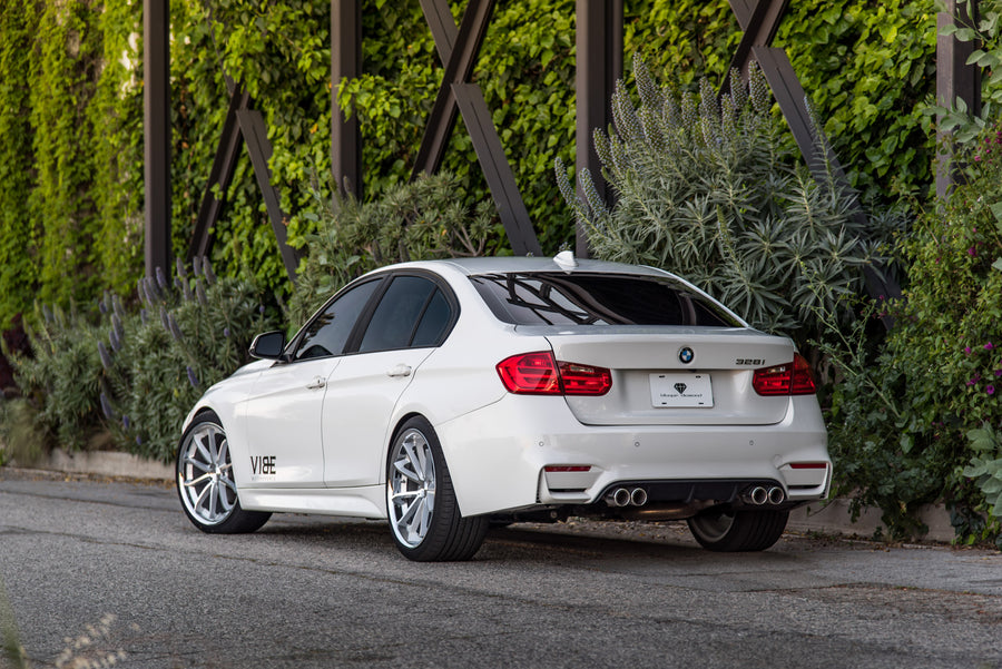 A 2014 BMW 328i on 20 Inch Staggered Silver with Chrome SS Lip Wheels