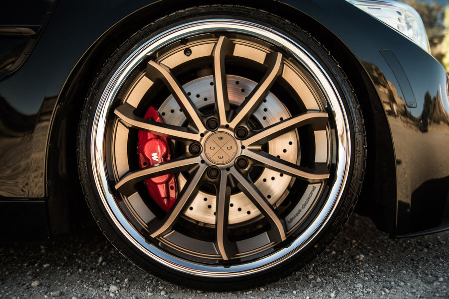 A 2015 BMW M4 on Staggered Blaque Diamond BD-23 Matte Bronze Wheels