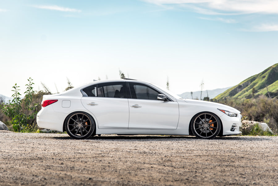 A 2015 Infiniti Q50 on 20 Inch Blaque Diamond BD-11 Matte Antique Bronze Wheels