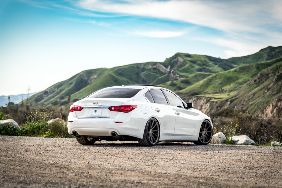 A 2015 Infiniti Q50 on 20 Inch Blaque Diamond BD-11 Matte Antique Bronze Wheels