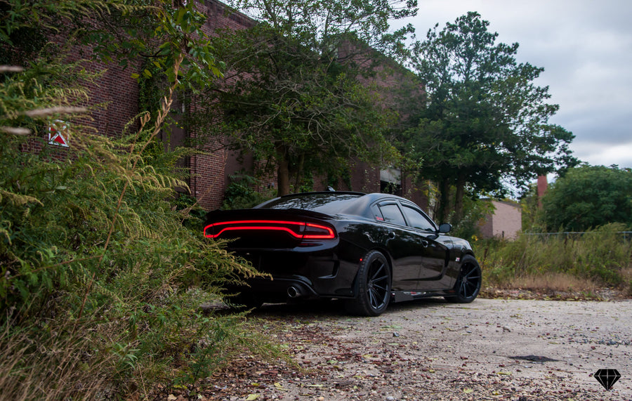A 2016 Dodge Charger Scat Pack on 20 Inch Blaque Diamond BD-11 Gloss Black Wheels