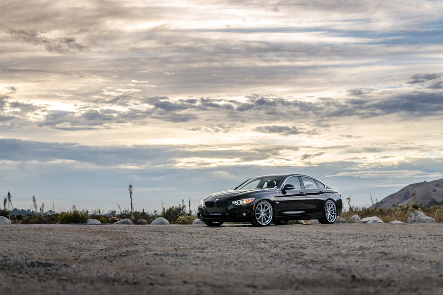A 2016 BMW 430i on 20 Inch Blaque Diamond BD-23 Silver with Chrome SS Lip Wheels