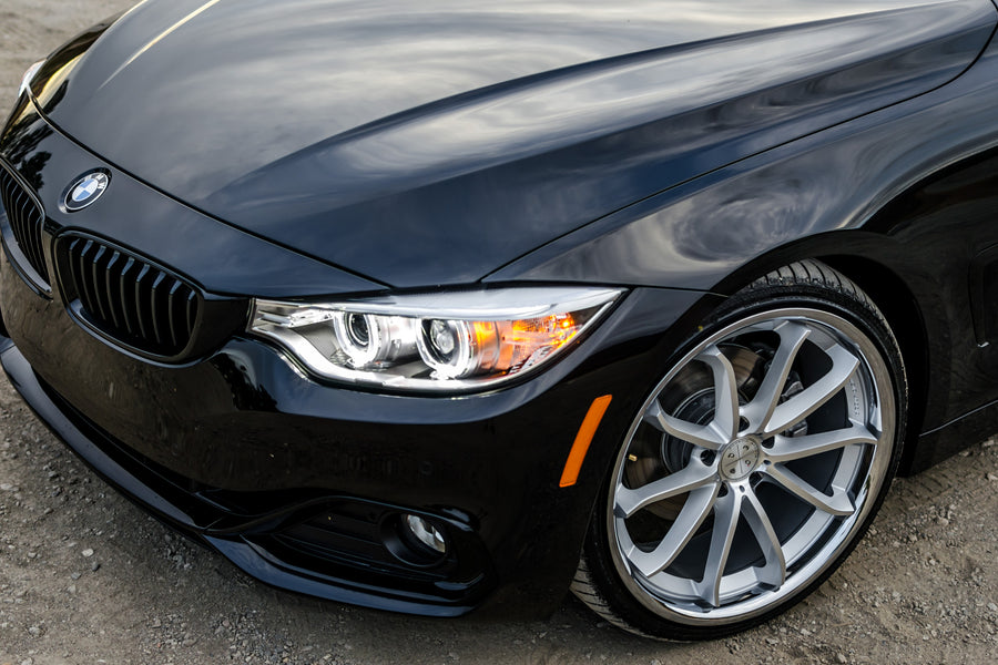 A 2016 BMW 430i on 20 Inch Blaque Diamond BD-23 Silver with Chrome SS Lip Wheels
