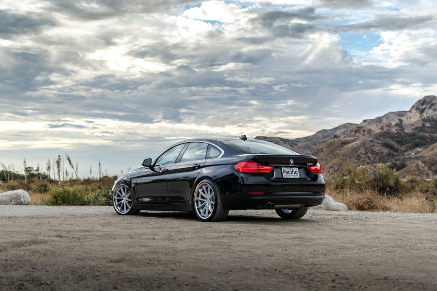 A 2016 BMW 430i on 20 Inch Blaque Diamond BD-23 Silver with Chrome SS Lip Wheels