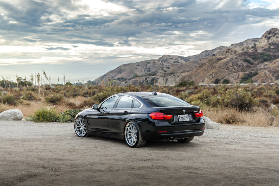 A 2016 BMW 430i on 20 Inch Blaque Diamond BD-23 Silver with Chrome SS Lip Wheels