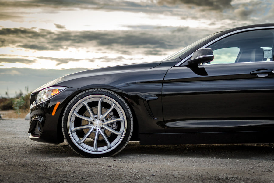 A 2016 BMW 430i on 20 Inch Blaque Diamond BD-23 Silver with Chrome SS Lip Wheels