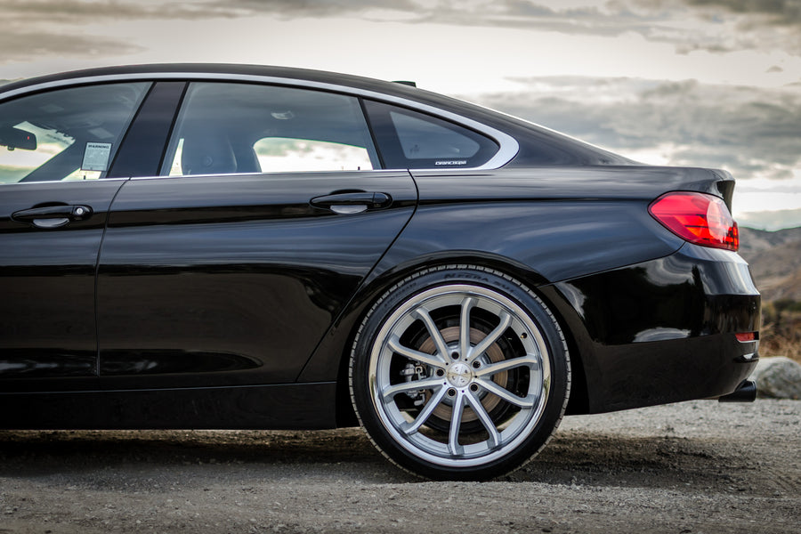 A 2016 BMW 430i on 20 Inch Blaque Diamond BD-23 Silver with Chrome SS Lip Wheels