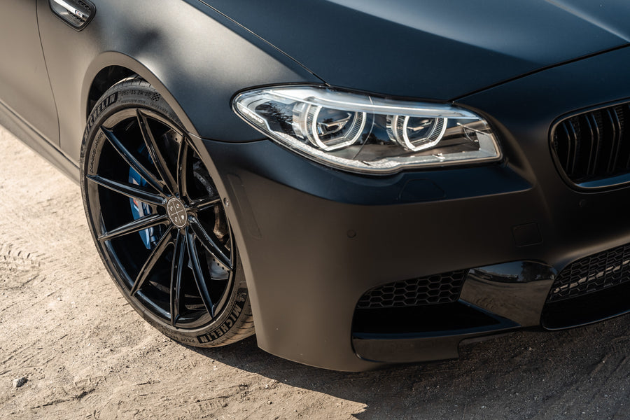 A 2016 BMW M5 on 20 Inch Blaque Diamond BD-11 Gloss Black Wheels