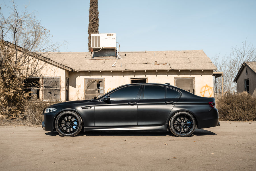 A 2016 BMW M5 on 20 Inch Blaque Diamond BD-11 Gloss Black Wheels