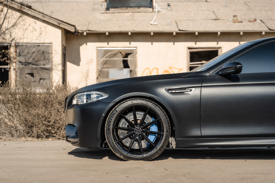 A 2016 BMW M5 on 20 Inch Blaque Diamond BD-11 Gloss Black Wheels