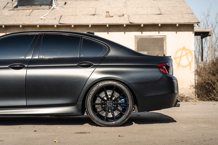 A 2016 BMW M5 on 20 Inch Blaque Diamond BD-11 Gloss Black Wheels