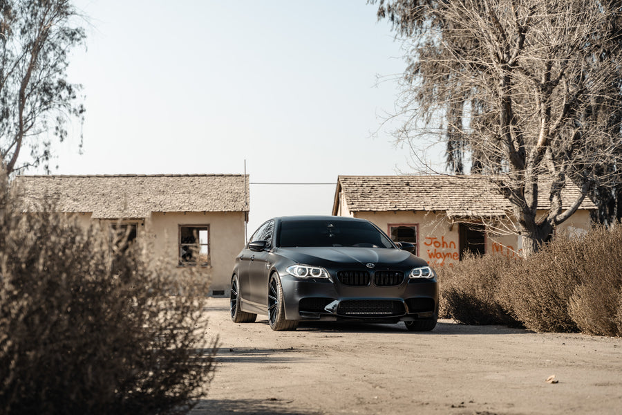 A 2016 BMW M5 on 20 Inch Blaque Diamond BD-11 Gloss Black Wheels