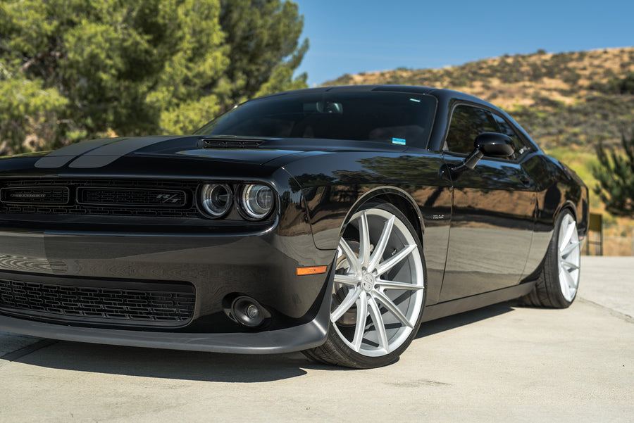 A 2016 Dodge Charger SRT on 22 Inch Blaque Diamond BD-11 Frozen Silver Wheels