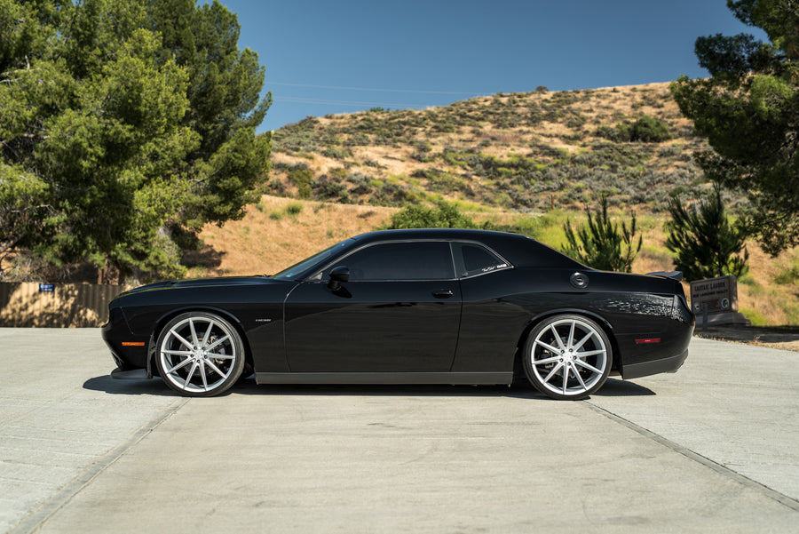 A 2016 Dodge Charger SRT on 22 Inch Blaque Diamond BD-11 Frozen Silver Wheels