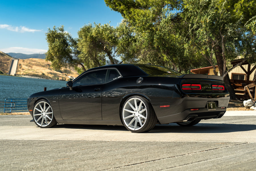 A 2016 Dodge Charger SRT on 22 Inch Blaque Diamond BD-11 Frozen Silver Wheels