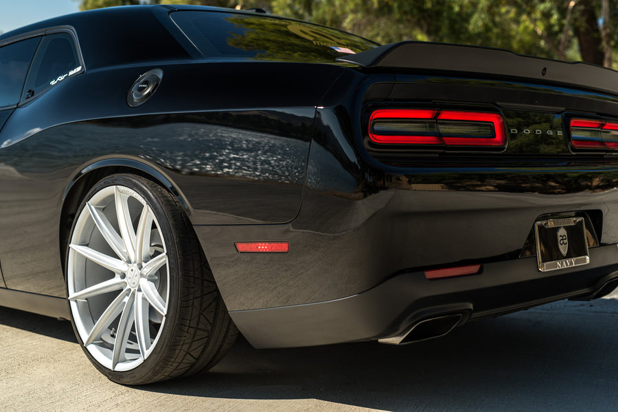 A 2016 Dodge Charger SRT on 22 Inch Blaque Diamond BD-11 Frozen Silver Wheels