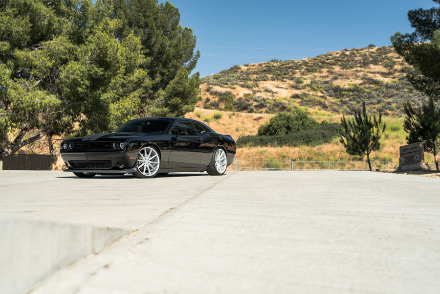 A 2016 Dodge Charger SRT on 22 Inch Blaque Diamond BD-11 Frozen Silver Wheels