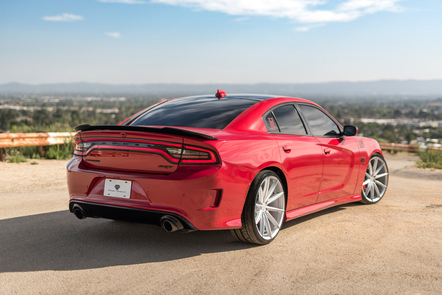 A 2016 Dodge Charger SRT on Blaque Diamond BD-11 Gloss Black Wheels