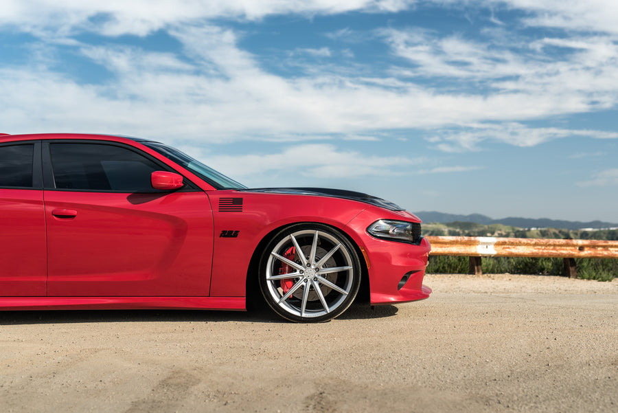 A 2016 Dodge Charger SRT on Blaque Diamond BD-11 Gloss Black Wheels