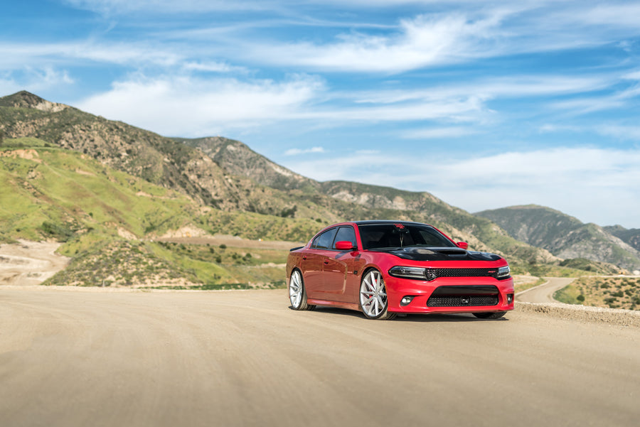 A 2016 Dodge Charger SRT on Blaque Diamond BD-11 Gloss Black Wheels