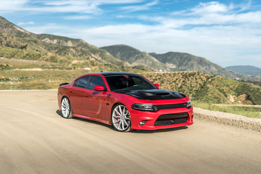 A 2016 Dodge Charger SRT on Blaque Diamond BD-11 Gloss Black Wheels