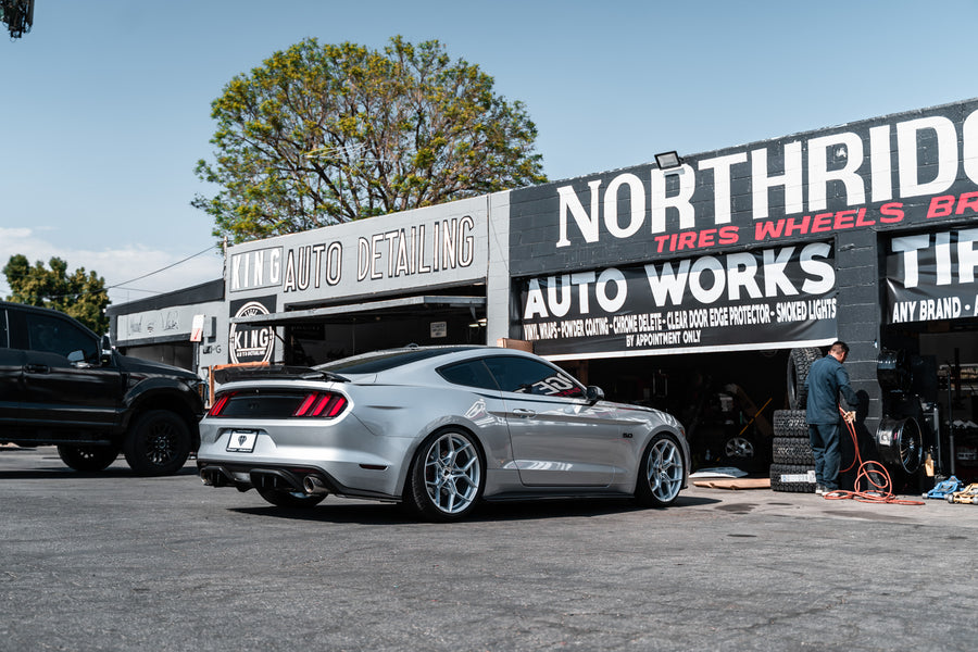 A 2016 Ford Mustang GT on 20 Inch Blaque Diamond BD-F25 Brushed Silver Wheels