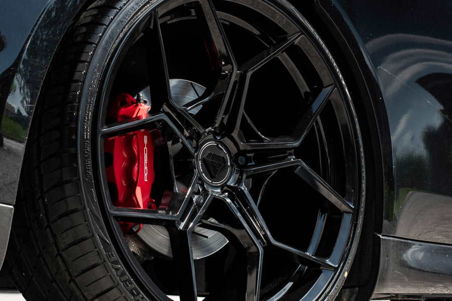 A 2016 Porsche Panamera 4S on 20 Inch Blaque Diamond BD-F25 Gloss Black Wheels