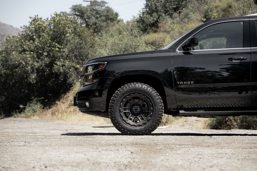 A 2017 Chevrolet Tahoe on 18 Inch Blaque Diamond BD-0801 Textured Black Wheels