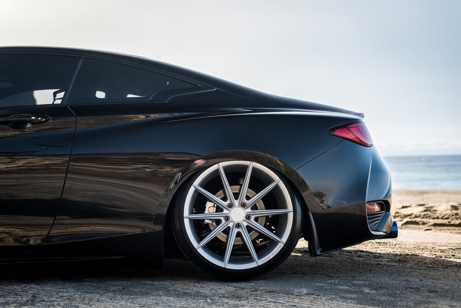 A 2017 Infinity Q60 on 20 Inch Blaque Diamond BD-11 Frozen Silver Wheels