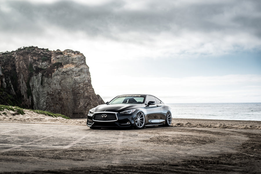 A 2017 Infinity Q60 on 20 Inch Blaque Diamond BD-11 Frozen Silver Wheels