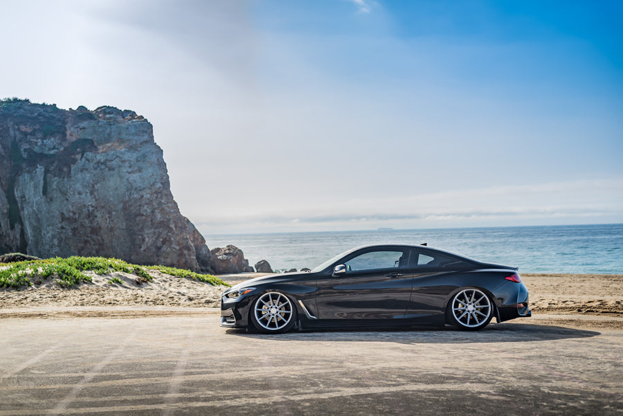 A 2017 Infinity Q60 on 20 Inch Blaque Diamond BD-11 Frozen Silver Wheels