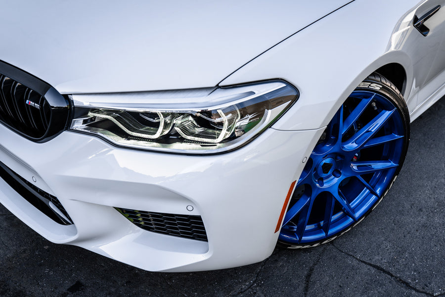 A 2018 BMW M5 on 20 Inch Blaque Diamond BD-F18 Brushed Blue Wheels